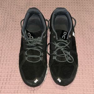 On running shoes, black and white size w8